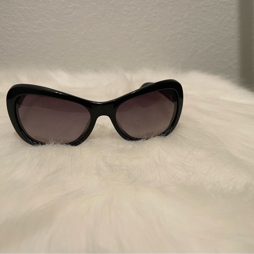 Black BCBG Sunglasses. Condition as pictured.